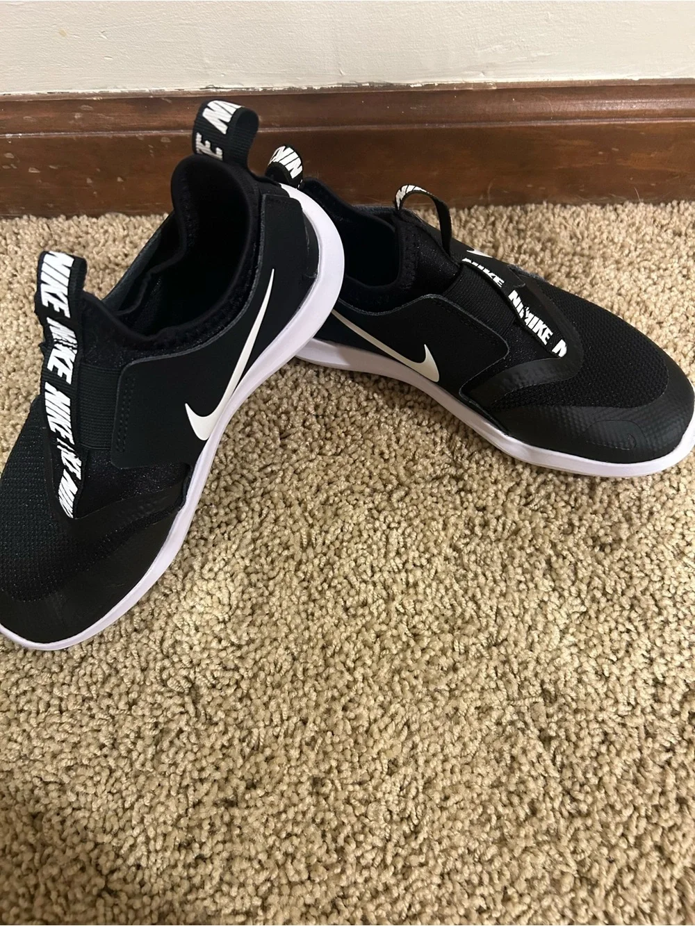 Nike Kids Black and White Slip-On Sneakers